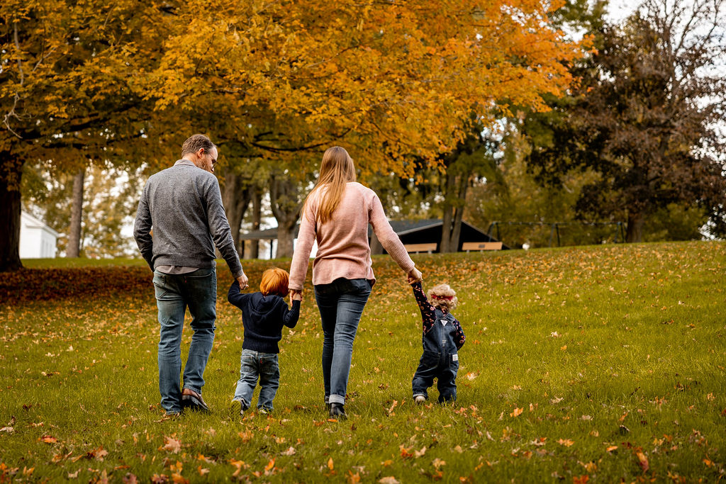 Family walking in the fall