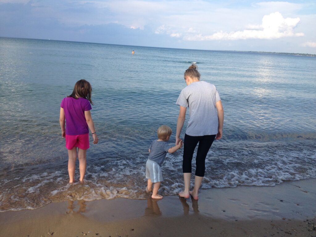 3 of Jennie's kids dipping their toes into Lake Huron.